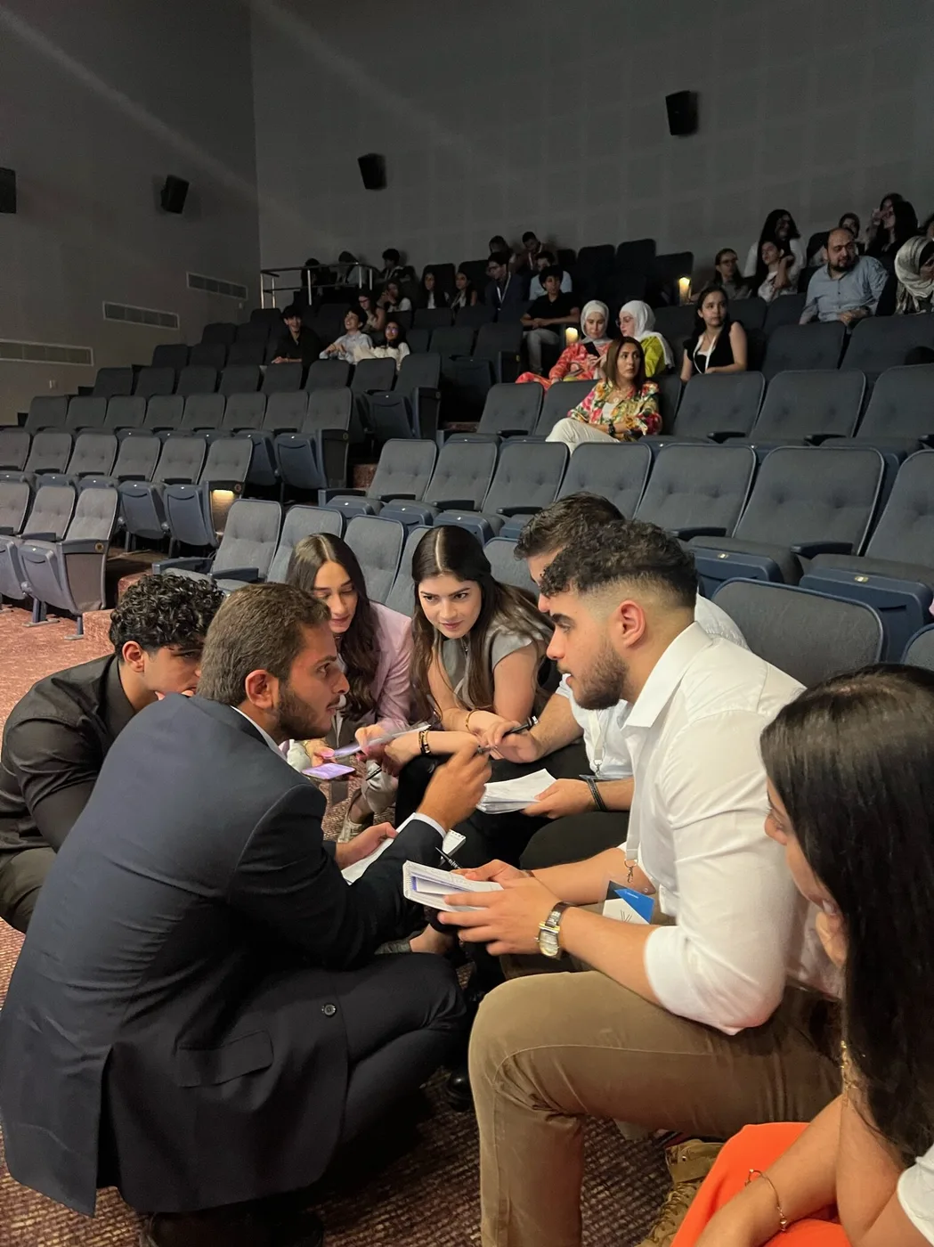 Students in a small group discussion during a VocationX event