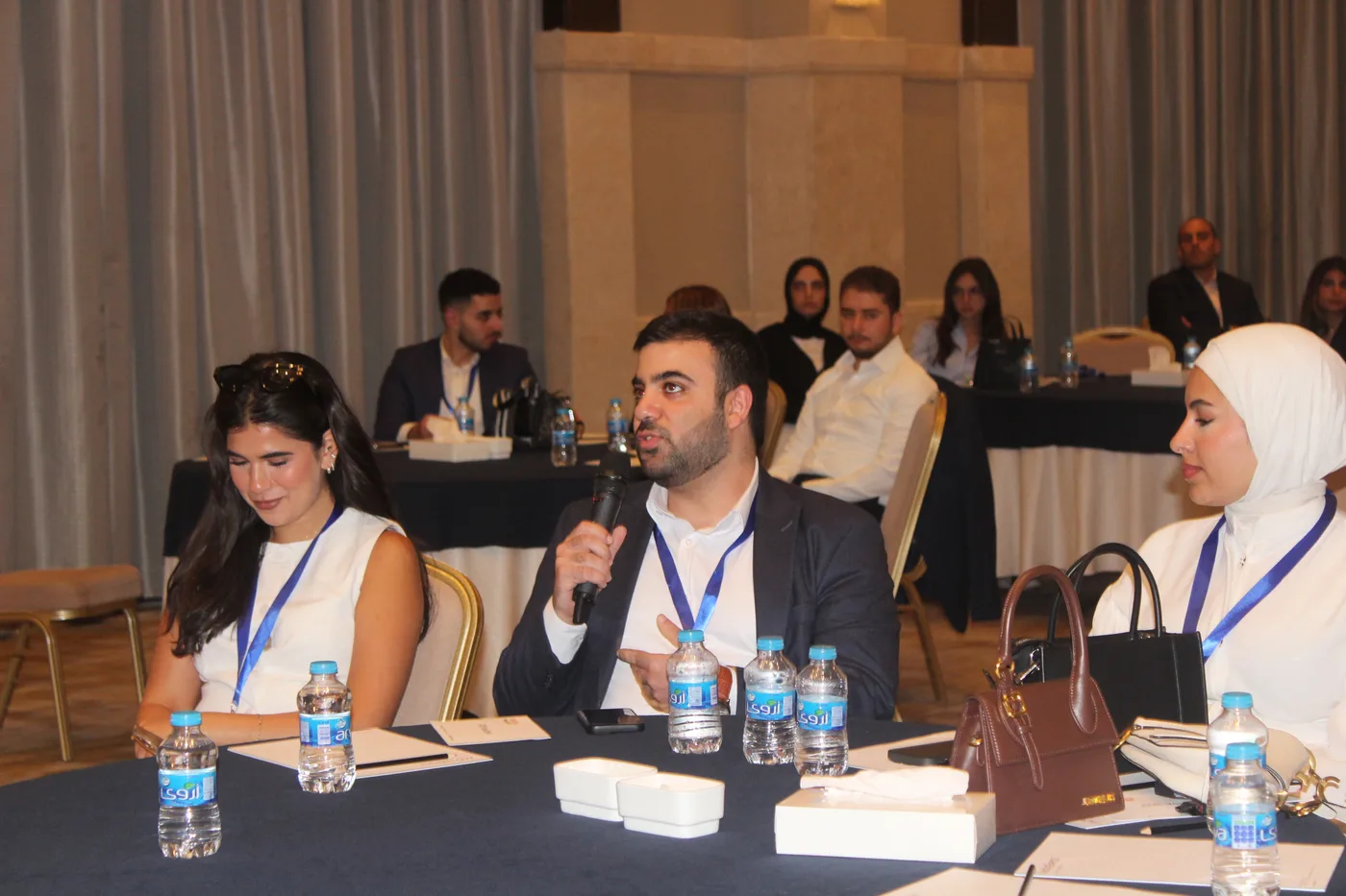 Healthcare professionals and students sharing a thoughtful discussion