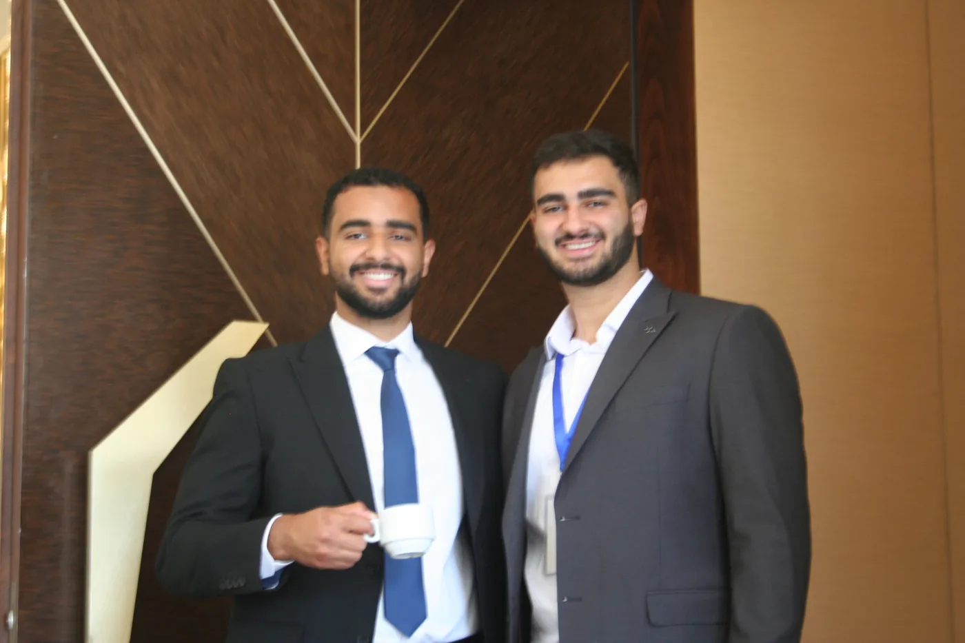 Two VocationX mentors smiling together after an event