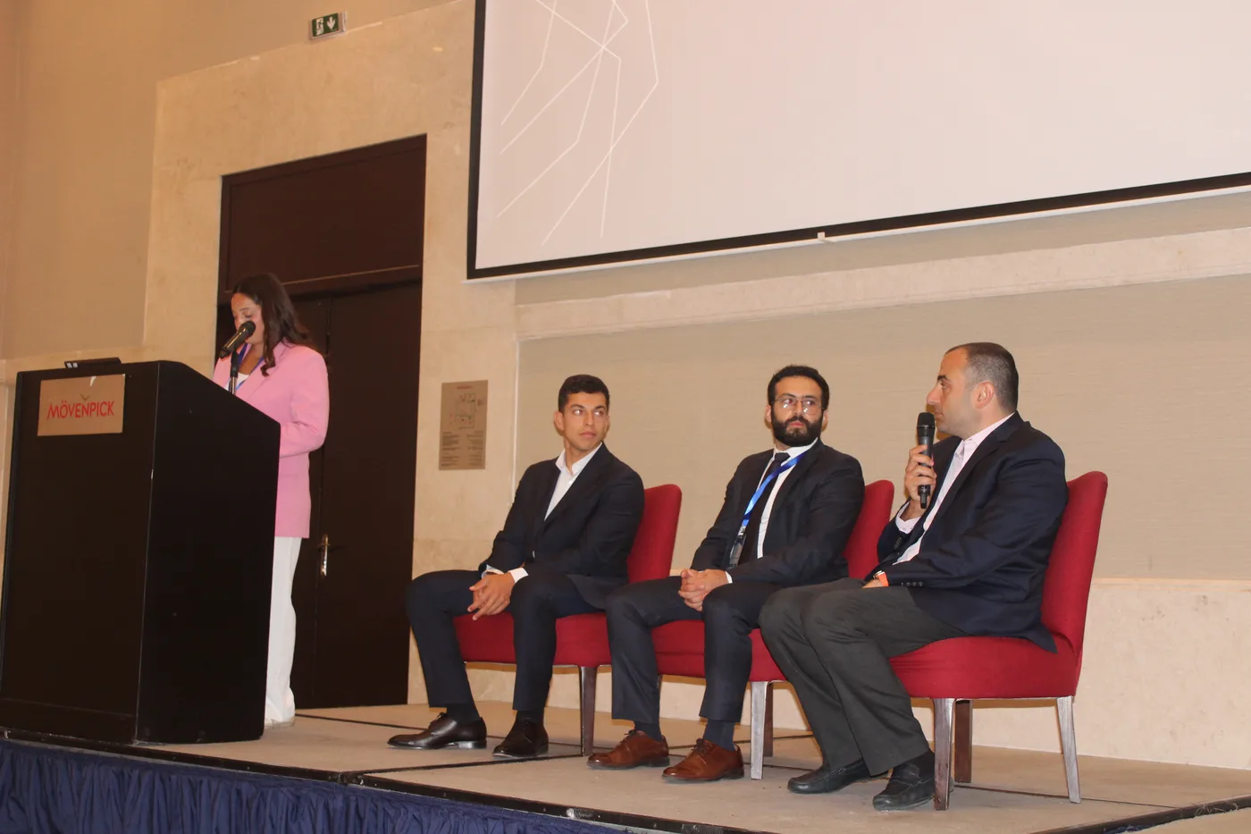 Panel of doctors answering student questions on stage